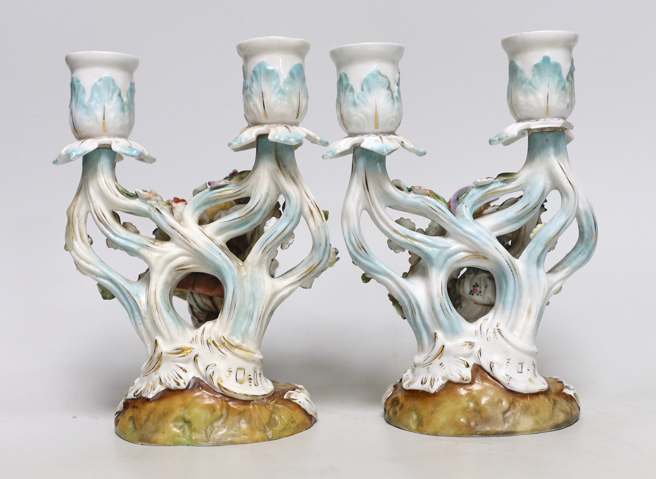 A pair of 19th century French figural two branch candelabra, 17cm high